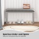 Upholstered gray bedroom bench with padded seat and solid wood legs, featuring spacious under-seat storage for.