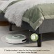RoboVac under an upholstered bed base, showcasing 8" height for easy cleaning and modern button-tufted design.