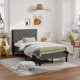 Upholstered bed base with button stitched headboard in a modern bedroom, featuring soft fabric and under-bed storage.