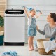 Full-automatic washing machine with stainless steel inner barrel, 1.5 Cu.Ft capacity, shown in a home setting with a.