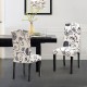 Set of 2 tufted upholstered dining chairs in black and white, featuring solid rubberwood legs and unique floral.