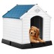 Durable plastic dog house with a blue roof, providing a safe, ventilated shelter for pets in outdoor conditions.