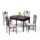 5-piece dining set featuring a wood table and 4 cushioned chairs, perfect for elegant dining experiences.