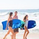 Two people carrying blue Super Bodyboards with EPS core on the beach, ready for summer surfing fun.