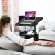 Height adjustable black laptop desk cart with tilt surface, open storage, and wheels for easy mobility in any room.