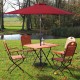 Half round patio umbrella base in antique black finish, designed for stability with ornate flower pattern and.