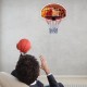 Wall mounted basketball hoop with 29" polypropylene backboard and two nylon nets, perfect for indoor play and fun.
