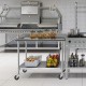 Stainless steel kitchen prep table with adjustable under-shelf and wheels for easy mobility, ideal for food preparation.