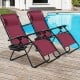 Two folding lounge chairs in wine color by the pool, made of steel and Textilene, perfect for outdoor relaxation.