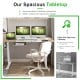 Electric adjustable sit to stand desk with a spacious 55" x 28" tabletop, USB port, and cable management for two.