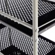 Close-up of the 4 tiers rolling cart storage rack with rust-resistant steel, featuring perforated shelves and.