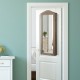 Wall-mounted jewelry armoire cabinet with full-length mirror, featuring organized storage for rings, necklaces, and.
