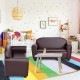 Kids sofa armrest chair in brown with storage function, perfect for reading and relaxing in a playful room setting.