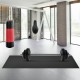 Thick black PVC equipment mat, 78 x 36 x 0.25 inches, ideal for gym use, reducing vibrations and protecting floors.