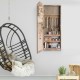 Wall-mounted jewelry armoire cabinet with mirror, featuring hooks and shelves for organized storage of accessories.