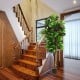 6-feet artificial fiddle leaf fig tree featuring a sturdy base and lush layers of leaves, ideal for enhancing home.