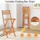 Portable acacia wood bar height chair with backrest, featuring a folding design for easy storage and outdoor use.