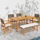 Acacia wood dining table for 6 with slatted top, perfect for outdoor dining on patios or terraces.