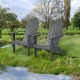 Gray acacia wood outdoor Adirondack chairs with ergonomic design, perfect for patio relaxation by the water.
