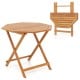 Folding acacia wood dining table with slatted octagonal top, designed for 4, perfect for outdoor gatherings and patios.