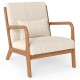 Beige corduroy accent chair with lumbar pillow and solid wood frame, ideal for living rooms and home offices.