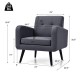 Upholstered accent chair with ergonomic backrest and wide armrests, part of a modern living room furniture set.
