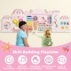 Wooden pink activity wall busy board for toddlers featuring various skill-building activities for sensory play.