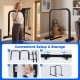 Adjustable dip bar station in black with foam-padded handles, designed for calisthenics and strength training at home.