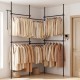 Adjustable floor-to-ceiling clothes rack with two hanging rods, perfect for organizing jackets and T-shirts in any space.