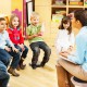 Adjustable-height pink wobble chair for active learning, promoting good posture and core strength in children.
