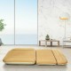 Inflatable SUV air backseat mattress in soft yellow, ideal for camping and road trips, shown in a spacious indoor.