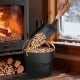 Black metal ash bucket with leather handles, ideal for storing ash and pellets by the fireplace or fire pit.