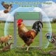 Automatic chicken coop door with robust metal construction, remote control, and light sensor for predator protection.