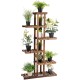 6-tier wooden plant rack stand showcasing various potted plants, perfect for indoor or outdoor use in gardens or patios.