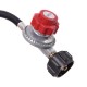 Gas regulator with adjustable pressure for the 150,000 BTU double burner outdoor stove, ideal for camping and grilling.