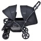 Double baby stroller in black with adjustable seats, safety belts, and shock-proof wheels for two babies.