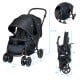 Double seat baby stroller in black with adjustable handles, safety belts, and compact fold for easy transport.