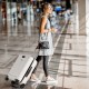 20-inch white hardside carry-on luggage with front pocket and USB port, perfect for short trips and business travel.