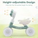 Close-up view of the green baby balance bike's height-adjustable seat and handlebars, promoting comfort and safety for.