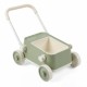 Baby push walker in green features a foldable handlebar, large storage basket, and wear-resistant wheels for stability.