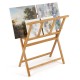 Bamboo art print rack with open storage design, holding canvases up to 34" x 19", ideal for art studios and exhibitions.