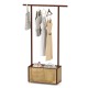 Bamboo clothes rack with hanging rod and rattan storage basket, featuring wheels for easy movement and rustic style.