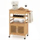 Bamboo rolling kitchen island trolley features a wine rack, spacious cabinet, and towel rack for convenient storage and mobility.