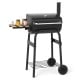 Barrel charcoal grill with foldable side table, built-in thermostat, and adjustable air vents for backyard cooking.
