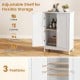 White bathroom floor storage cabinet with double doors and adjustable shelves for organizing toiletries and towels.