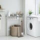 Bathroom over-the-toilet storage organizer in white with adjustable shelves, perfect for maximizing space and keeping.
