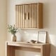 Bathroom wall cabinet with slatted doors, adjustable shelves, and natural finish, ideal for organized storage in any.