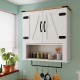 White farmhouse wall cabinet with barn doors, adjustable shelf, and towel bar for versatile bathroom storage.