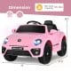 Pink Volkswagen Beetle kids electric ride-on car with remote control, featuring lights, sounds, and a smooth spring.