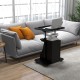 Adjustable mobile standing desk cart in black with tilt desktop, 2-tier shelves, and rolling casters for versatile use.